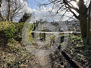 Exit from Heaton Woods, with a footpath, leading to a gate on, Shay Lane, Bradford, UK photo
