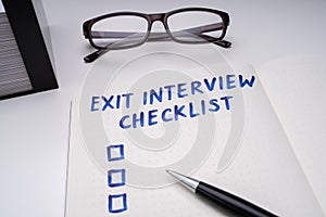 Exit Interview Checklist Message On Notebook