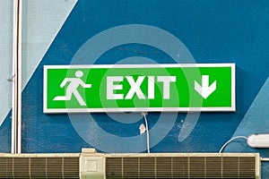 Exit sign on building wall