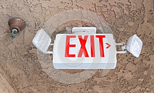 Exit sign with emergency light and fire extinguishing system
