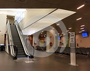 Exit sign in the hall of Health center of Bologna. Social distancing due to Covid-19 restrictions photo