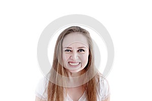 Exited grinning woman with expression on her face, close-up portrait of natural attractive female