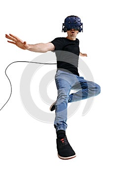 Exited guy using a virtual reality headset isolated on white background