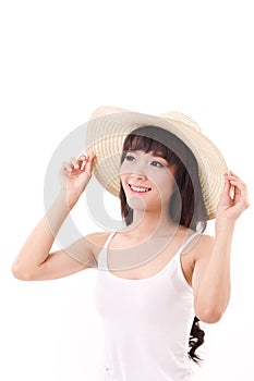 Exited, happy, smiling woman looking up, hand holding hat