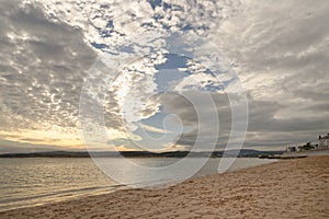 Exmouth, devon: low tide, beach and sunset. Cloudscape horizon photo