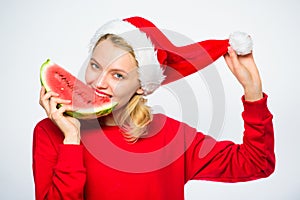 Exotic christmas concept. Christmas girl eat watermelon. Exotic winter holiday. Celebrate new year summer. Girl wear