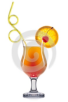 Exotic cocktail in hurricane glass isolated on white background