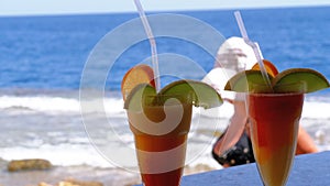 Exotic cocktails on the bar counter on the background of the Red Sea