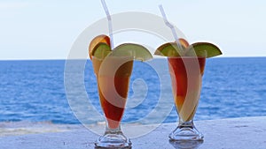 Exotic Cocktails on the Bar Counter on the Background of the Red Sea