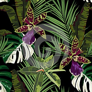 Exotic flowers seamless pattern. Tropical violet green orchid flowers and palm leaves in summer print.