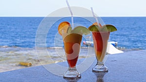 Exotic Fresh Cocktail on the Bar Counter on the Background of the Red Sea