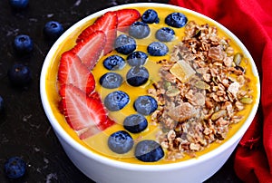 Exotic fresh fruit smoothie bowl