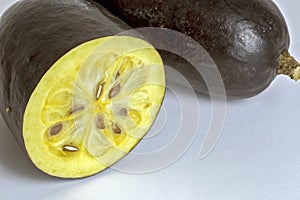 The exotic fruit jambolan sliced on white background photo