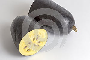 The exotic fruit jambolan sliced on white background photo