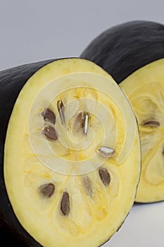 The exotic fruit jambolan sliced on white background photo