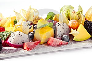 Exotic Fruit Plate or Vegan Platter with Sliced Fruits and Berries