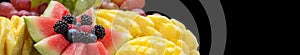 Exotic Fruit Platter Close-Up with Watermelon and Berries. Banner for site