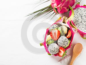 Exotic fruit salad with pitaya, strawberry and kiwi