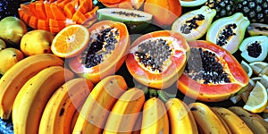 Exotic fruit for sale in a market stall.