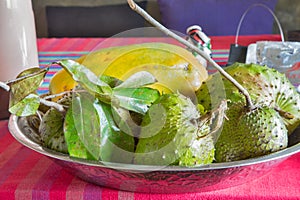 Exotic fruits lie on a platter. photo