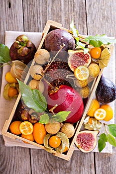 Exotic fruits in a wooden crate