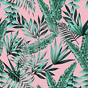 Exotic green tropical leaves seamless pattern pink background