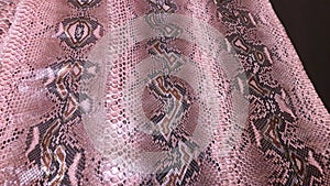 Exotic haberdashery leather, python skin, snake skin. Pink leather for accessories.