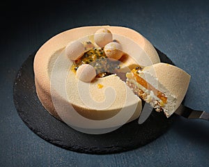 Exotic mousse cake with pasiflora, mango, mascarpone