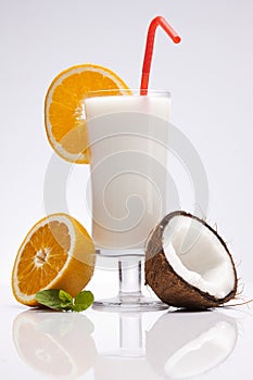 Exotic Pina Colada Drink with fruits on white