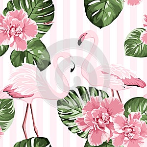 Exotic pink flamingo birds couple. Bright camelia flowers. Tropical monstera green leaves. Trendy seamless pattern. photo