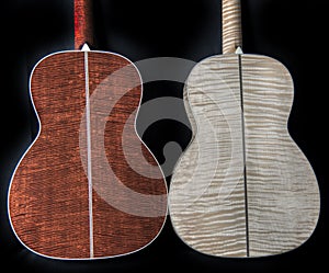 Exotic, rare and figured wood on the backs of acoustic guitars - flamed maple figured tiger mahogany