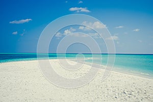 Exotic tropical beach background. Summer vacation, tourism, popular destination, luxury travel concept. Maldives. Seascape white s