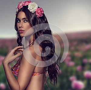 Exotic woman with flowers in her hair