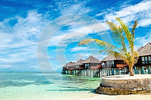 Exotic wooden huts on the water, Maldives