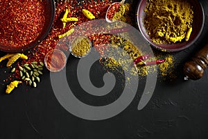 Exotically Spice Mix - spice, herbs, powder top view over dark background. Cooking and spicy food concept. Copy space