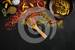 Exotically Spice Mix - spice, herbs, powder top view over dark background. Cooking and spicy food concept. Copy space