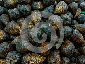 expanse of snakefruit at the market