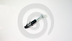 The expansion bolt shield on a white background.Construction tools