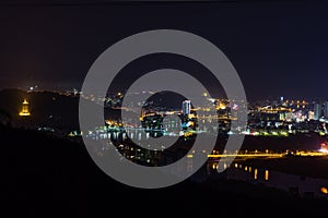 Expansive Chinese city of Longquan at night photo