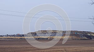 Expansive landfill site illustrating pollution