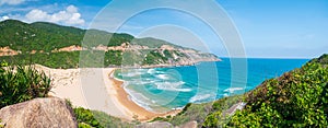 Expansive view of scenic tropical bay, Bai Mon gorgeous golden beach sand dunes blue waving sea. The easternmost coast in Vietnam