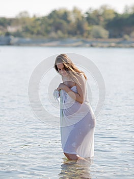 Expectant mother bathes in sea