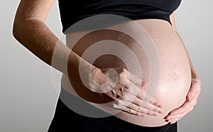 Expectant mother and labor contraction photo