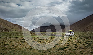 Expedition vehicle on mountain road, Indian Himalaya