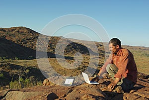 Expeditionary man with laptop