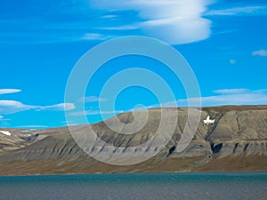 Expeditions cruise in the arctic ocean with view of die mountain landscape. Svalbard. photo