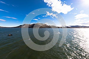 Expeditions cruise in the arctic ocean with view of die mountain landscape. Svalbard. photo