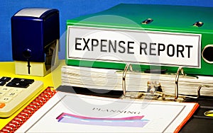 Expense report-text label in the Registrar`s folder. photo