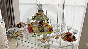 Expensive buffet with fresh organic and exotic fruits pineapple, figs, coconut