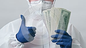 Expensive healthcare doctor money fan thumb up